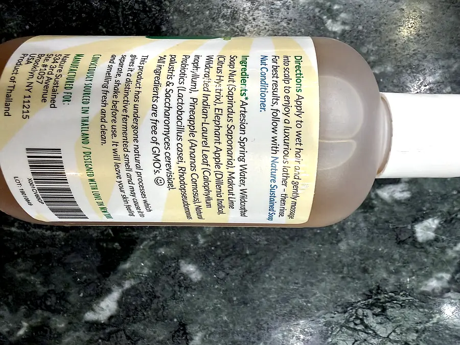 Photograph of the ingredient list on Nature Sustained Raw & Wild Soap Nut Shampoo, scent-free (266 ml)